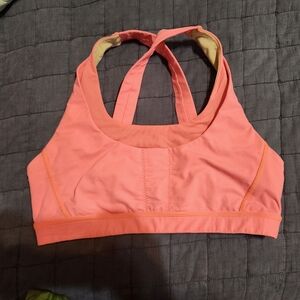 Lululemon pink crisscross back Athletic top bra top size 10